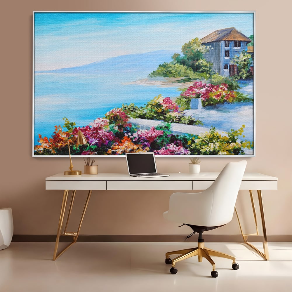 Tablou canvas cu tablou pictura cu flori si mare, in rama de aluminiu argintiu, pe perete intr-un birou